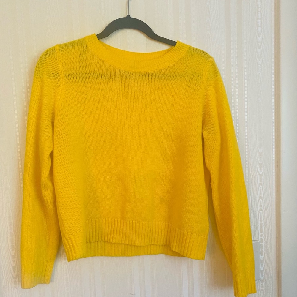 Bright yellow sweater